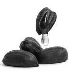 Graines de jojoba et goutte d’huile